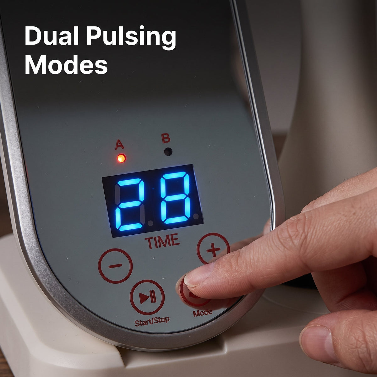Close up of the mirror-front control panel displaying intensity levels and pulsing modes.