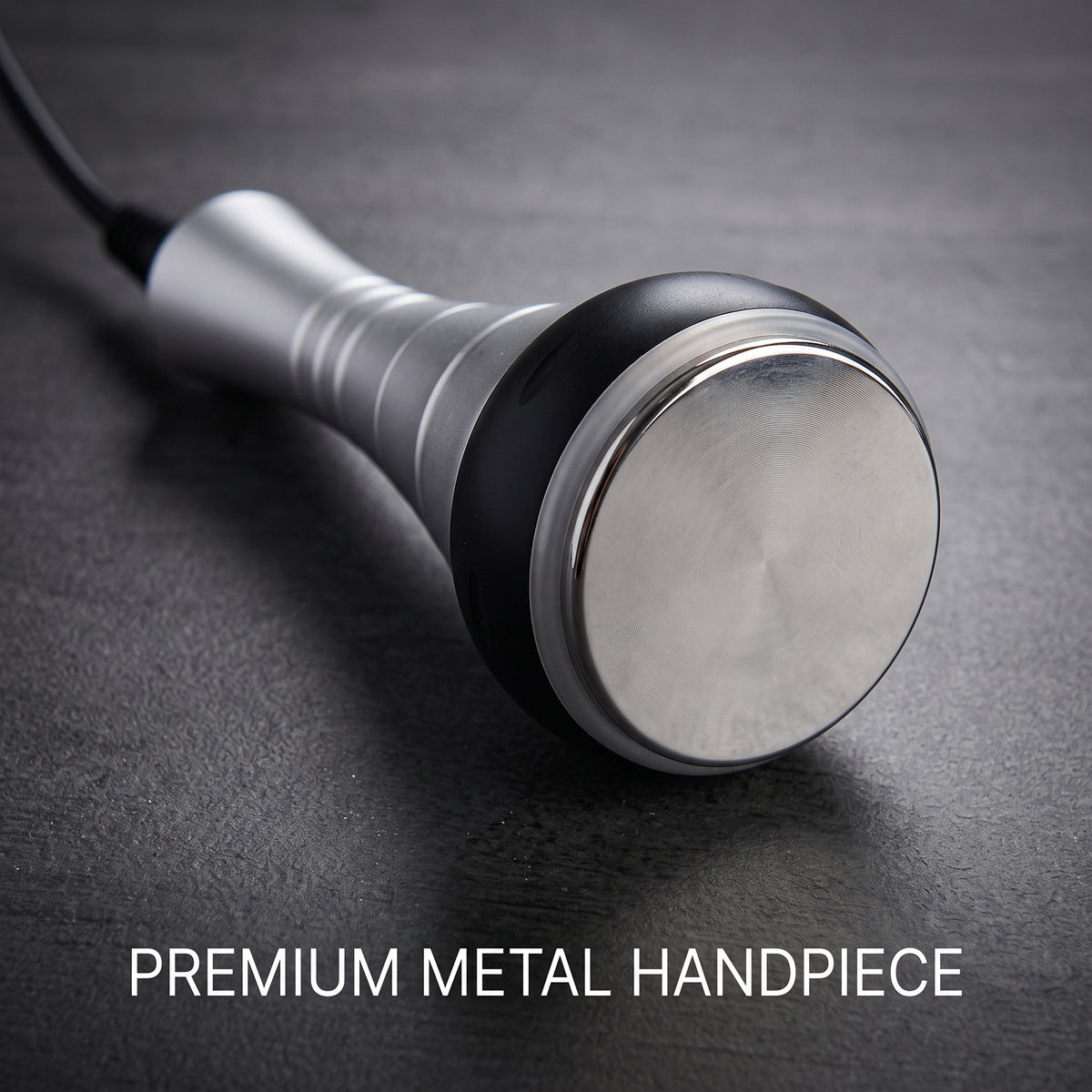 Close-up of the 40K ultrasonic cavitation metal body handpiece with flat contact surface