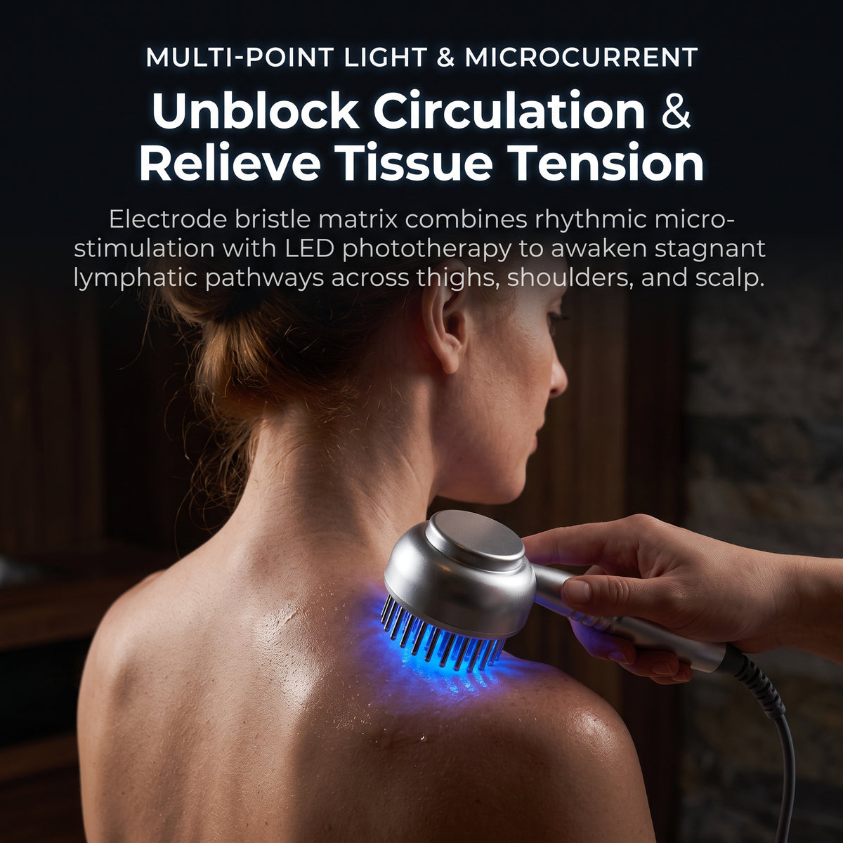 Model using the Litevisage 9-in-1 LED meridian brush with illuminated microcurrent bristles for shoulder lymphatic drainage and scalp tension relief.