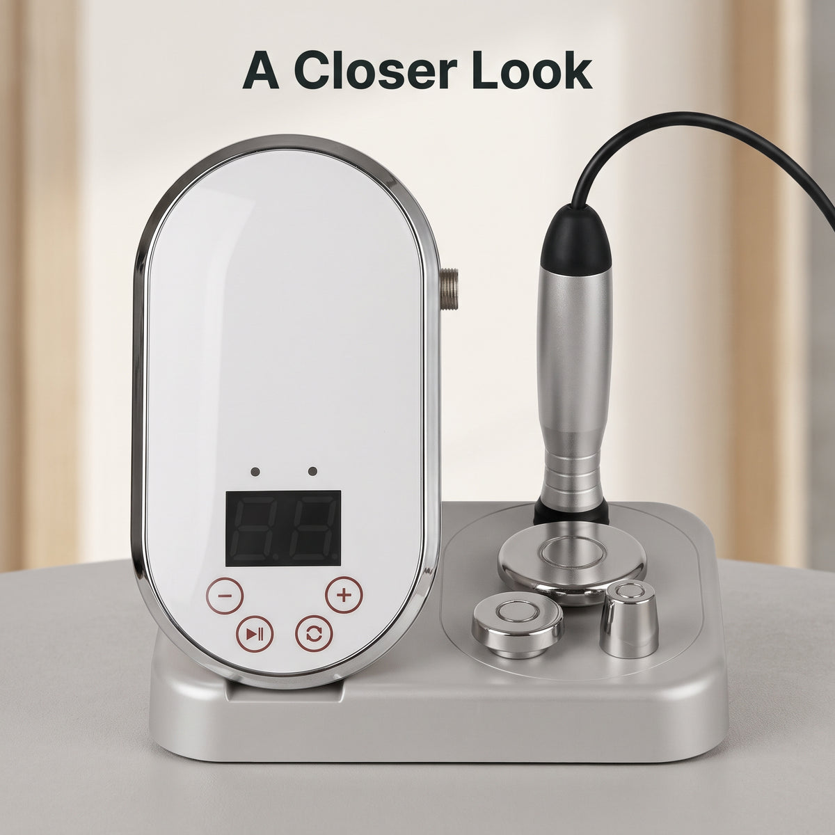 Close-up of the Litevisage P10 mirror panel, control markings and silver-and-black handpiece.